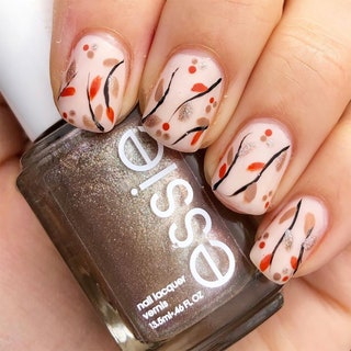 Manicured with illustrations of fall leaves on tree branches